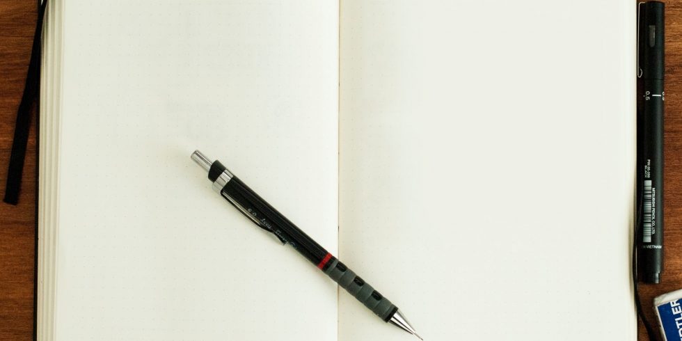 Image of notebook and pen
